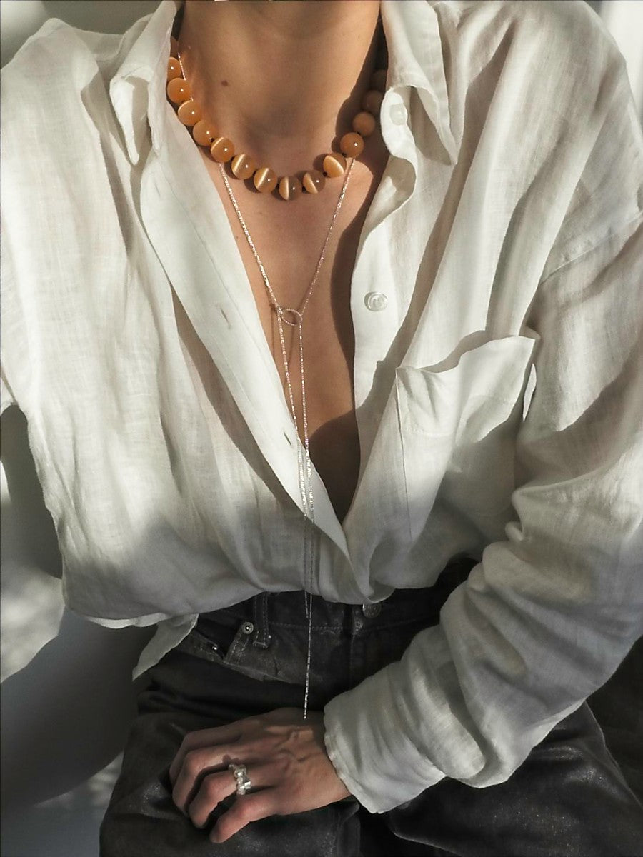 Louminous peach necklace | Cat's Eye