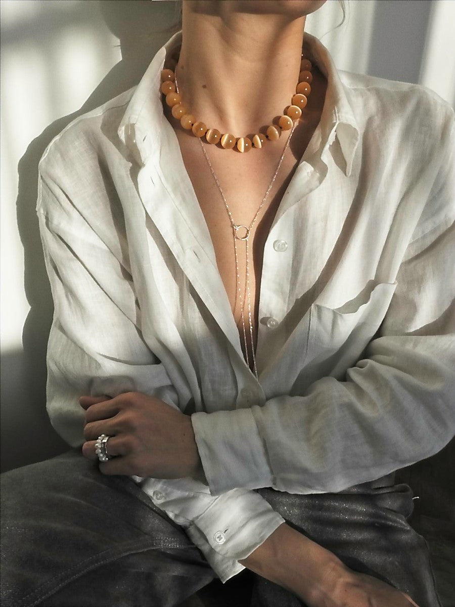 Louminous peach necklace | Cat's Eye